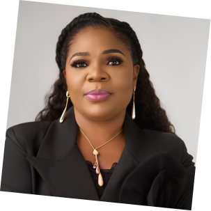 Founder in a black blazer and pendant necklace